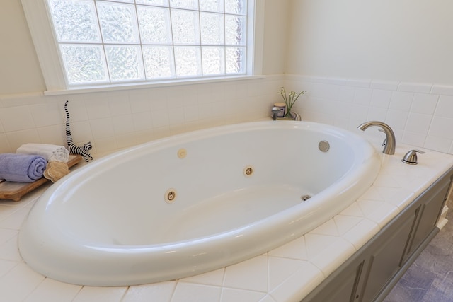 bathroom featuring a whirlpool tub