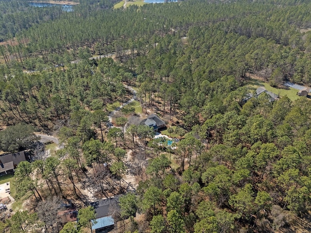 bird's eye view featuring a view of trees