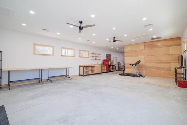 garage with visible vents, a ceiling fan, and recessed lighting