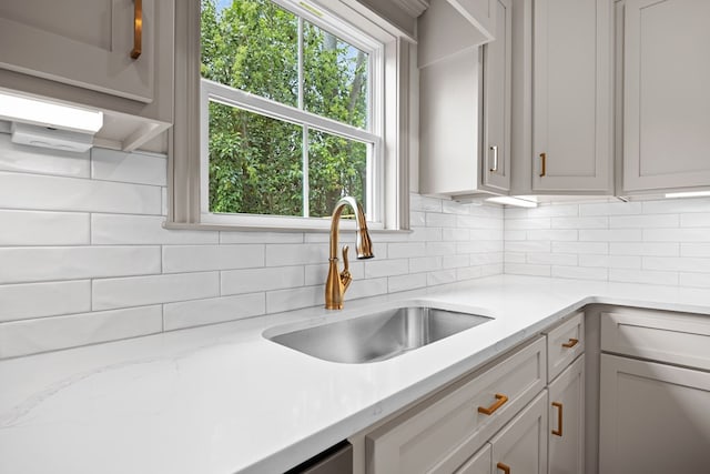 2204 N Oak St, Valdosta, GA 31602 - kitchen featuring a sink and backsplash