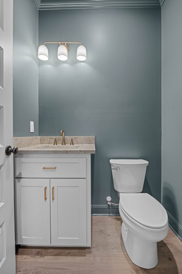 2204 N Oak St, Valdosta, GA 31602 - bathroom featuring vanity and wood finished floors