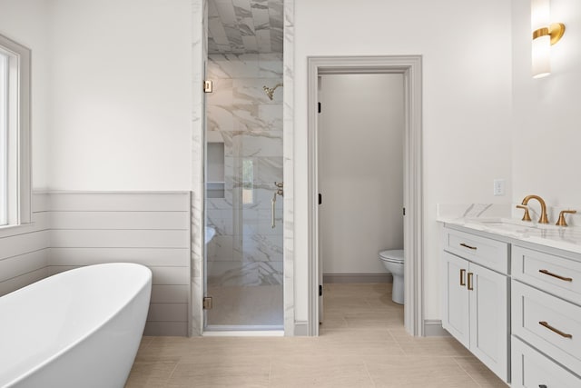 2204 N Oak St, Valdosta, GA 31602 - bathroom featuring a marble finish shower, a freestanding bath, vanity, and tile patterned flooring