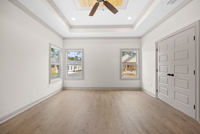 2204 N Oak St, Valdosta, GA 31602 - unfurnished room featuring a raised ceiling, light wood-type flooring, ceiling fan, ornamental molding, and recessed lighting