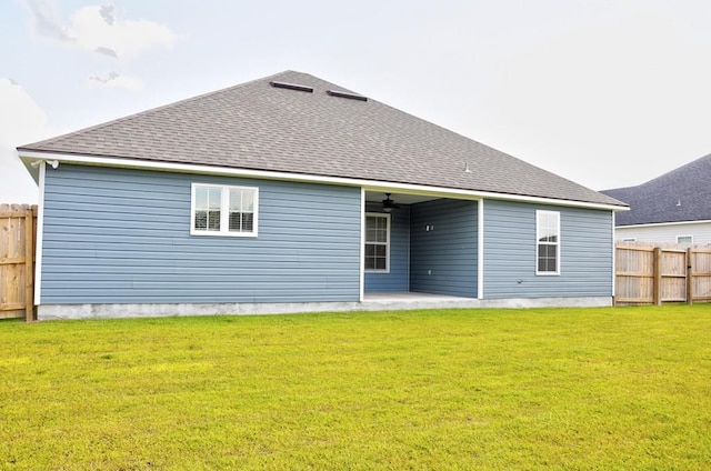 3968 Lu Ln, Hahira, GA 31632 - back of property featuring a yard, ceiling fan, and fence