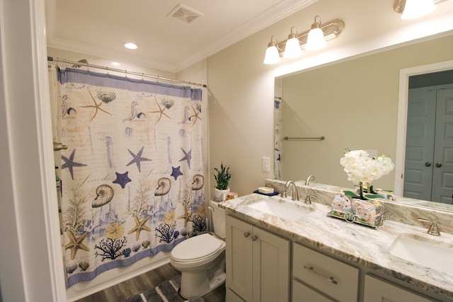 3968 Lu Ln, Hahira, GA 31632 - bathroom with a sink, visible vents, toilet, and crown molding