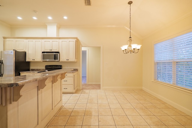 kitchen featuring decorative light fixtures, crown molding, a breakfast bar area, visible vents, and appliances with stainless steel finishes