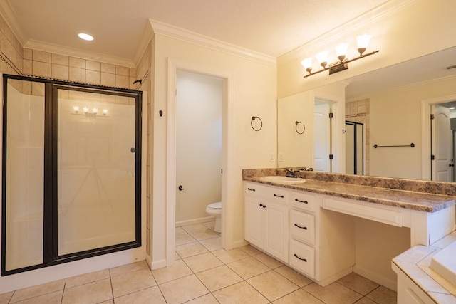 bathroom featuring a stall shower, toilet, tile patterned flooring, crown molding, and vanity