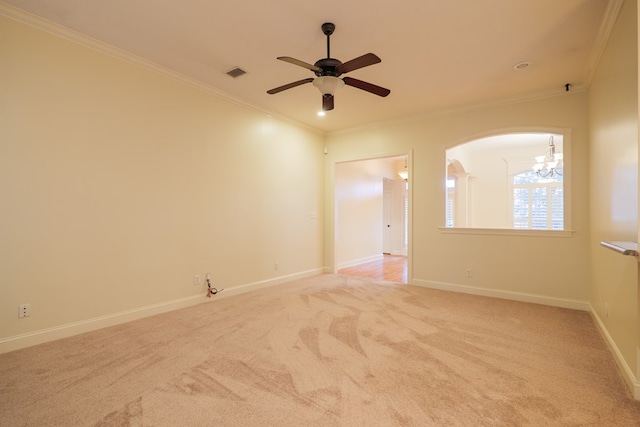 unfurnished room with arched walkways, crown molding, light carpet, baseboards, and ceiling fan with notable chandelier