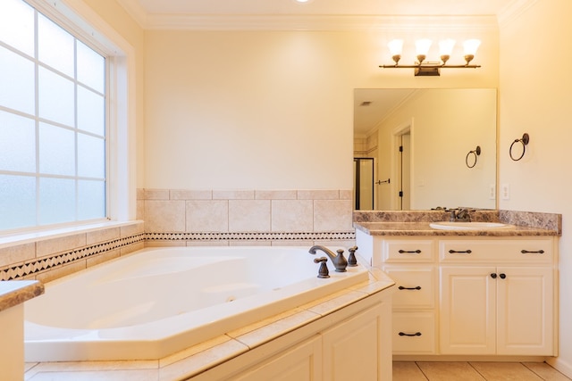 full bath featuring ornamental molding, tile patterned floors, vanity, and a bath