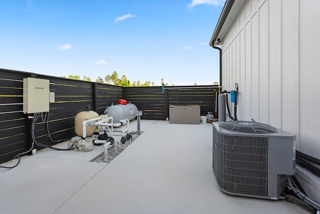 view of patio with central AC