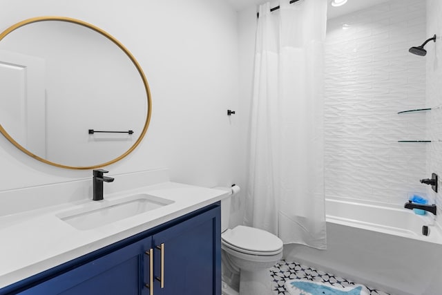 full bathroom with tile patterned flooring, shower / bath combination with curtain, vanity, and toilet