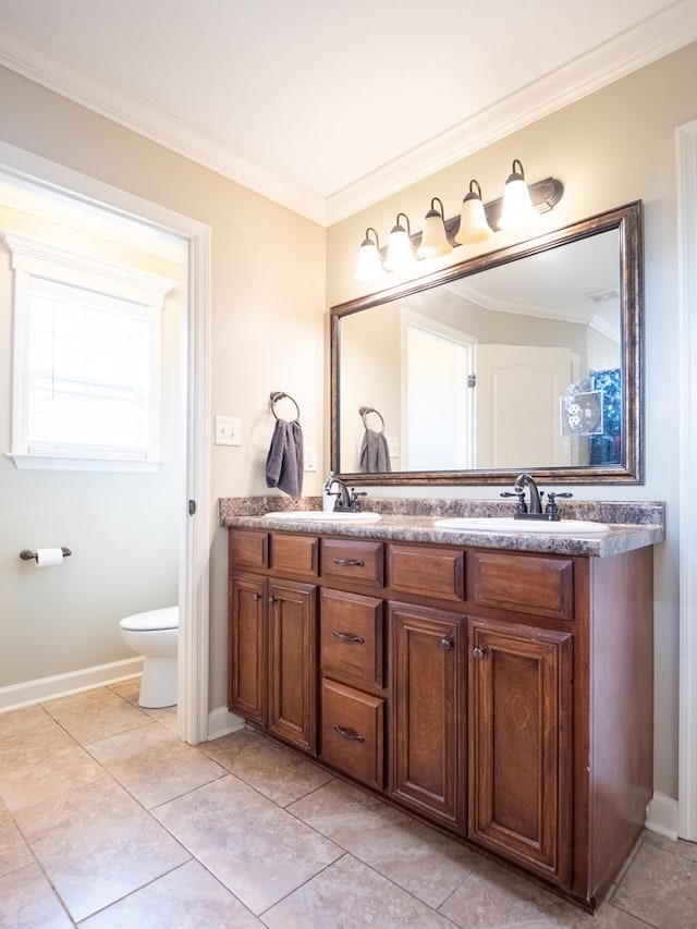 bathroom with vanity, tile patterned floors, ornamental molding, and toilet