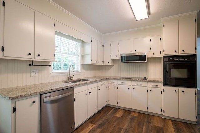 kitchen featuring black appliances, sink, white cabinetry, light stone countertops, and dark hardwood / wood-style flooring