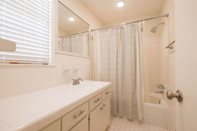 bathroom featuring decorative backsplash, tile patterned floors, vanity, and shower / bathtub combination with curtain