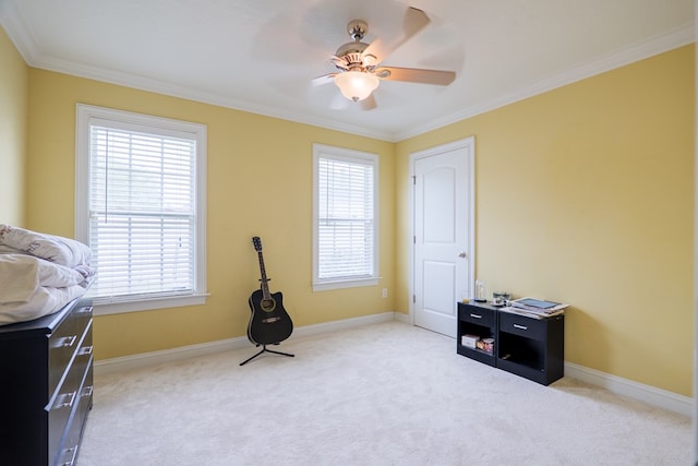 interior space with carpet flooring, multiple windows, and ornamental molding