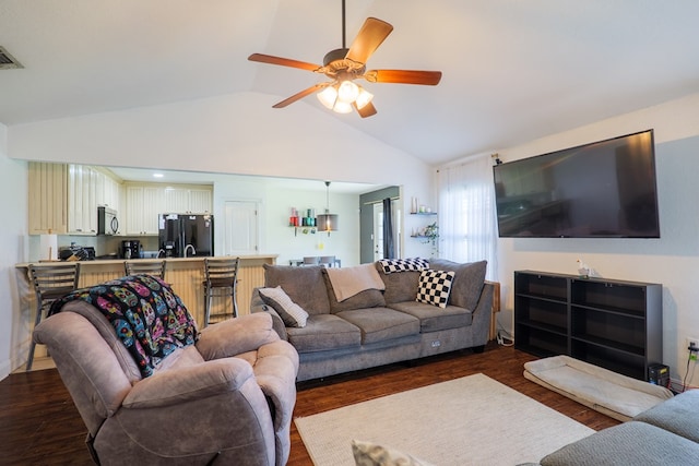 5187 Branch Point Dr, Valdosta, GA 31605 - living area featuring vaulted ceiling, a ceiling fan, and dark wood-style floors