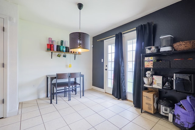 5187 Branch Point Dr, Valdosta, GA 31605 - tiled dining area featuring baseboards