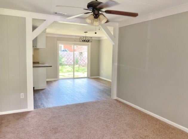 619 Lakeview Dr, Adel, GA 31620 - unfurnished room featuring ceiling fan, carpet, baseboards, and ornamental molding