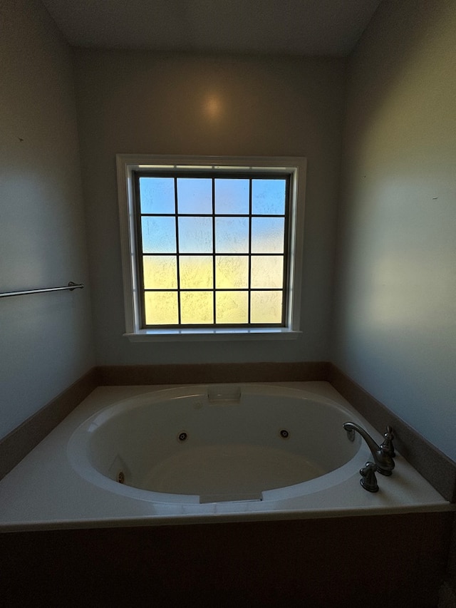 bathroom with a washtub