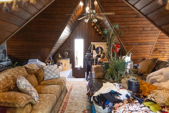 bedroom featuring vaulted ceiling, wooden walls, and wood ceiling