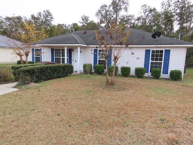 single story home with a front yard