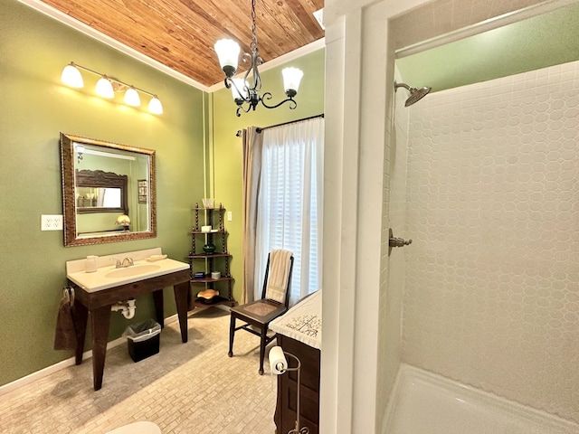 bathroom with a chandelier, a shower, ornamental molding, and wooden ceiling