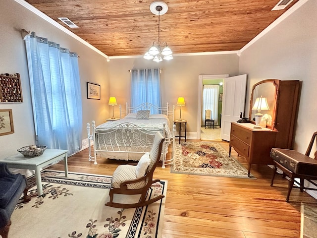 bedroom with an inviting chandelier, ornamental molding, wood ceiling, and hardwood / wood-style floors