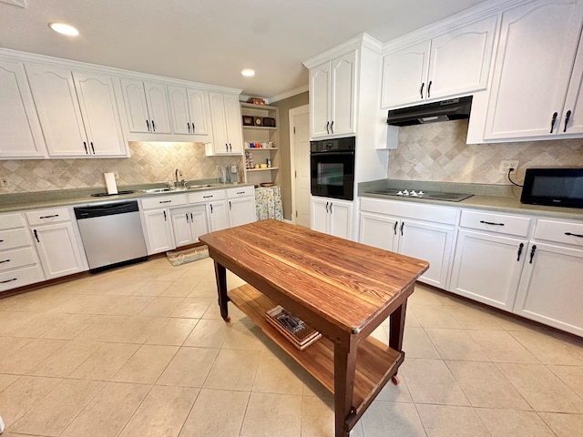 kitchen featuring light tile patterned floors, white cabinetry, sink, and black appliances