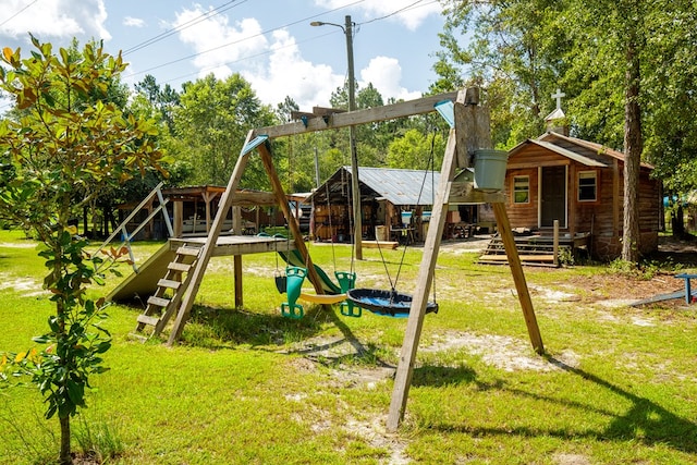 view of play area featuring a lawn