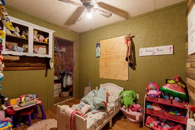 game room featuring ceiling fan and wood-type flooring