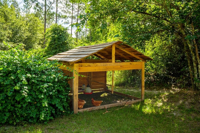 view of community featuring an outdoor structure