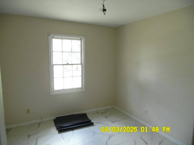 6 Prince Cv, Valdosta, GA 31601 - empty room with marble finish floor and baseboards
