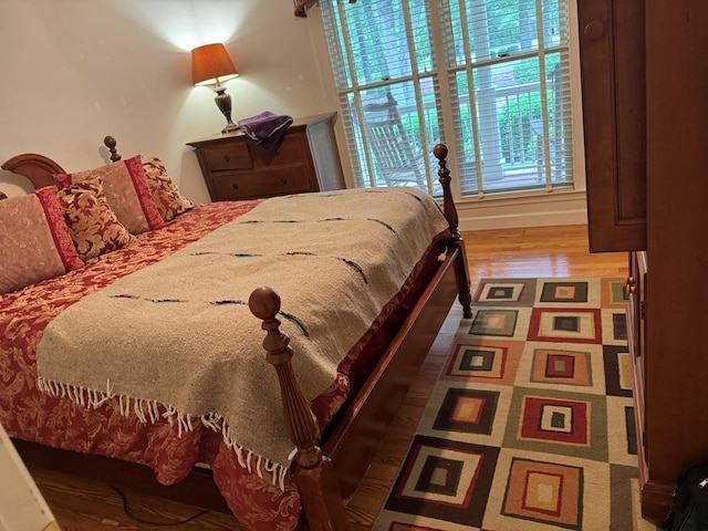 bedroom featuring hardwood / wood-style flooring