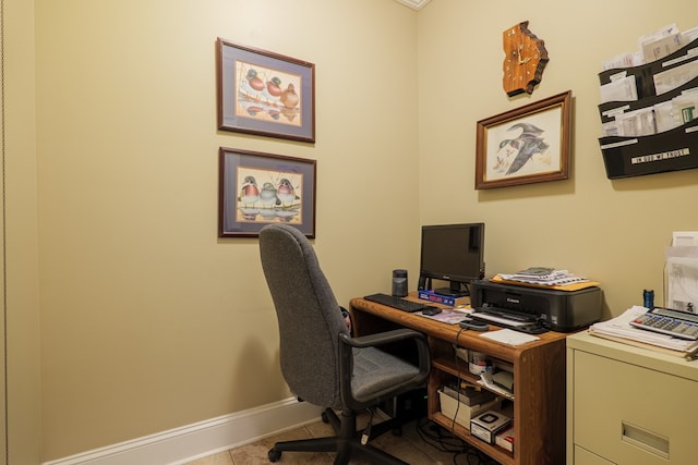 home office with tile patterned floors