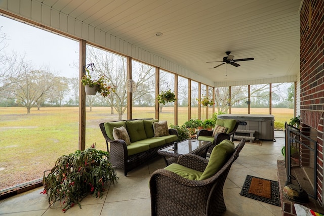 sunroom with ceiling fan