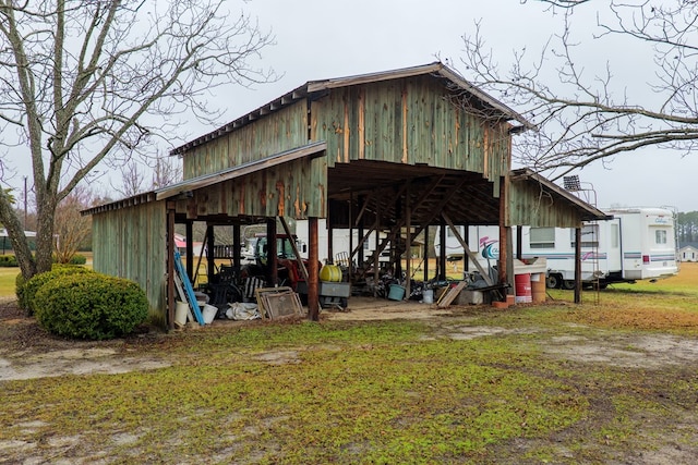 view of outdoor structure with a lawn