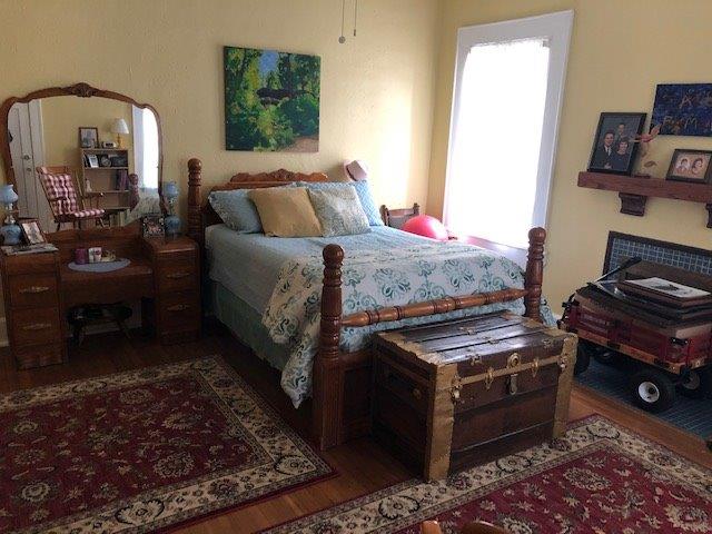 bedroom featuring hardwood / wood-style flooring