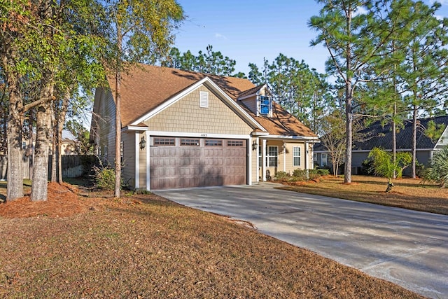 view of front of property with a garage