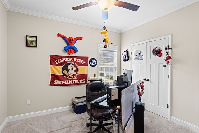 office space with carpet, ceiling fan, and ornamental molding