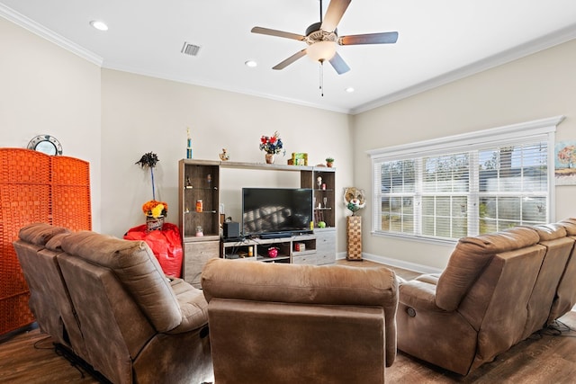 living room with ceiling fan, ornamental molding, and hardwood / wood-style flooring