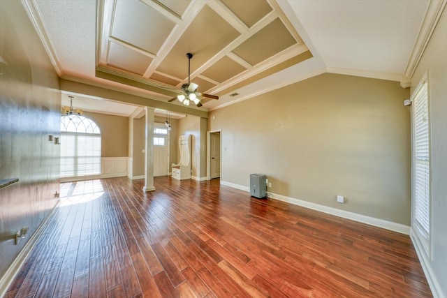 empty room with hardwood / wood-style flooring, ceiling fan, decorative columns, coffered ceiling, and ornamental molding