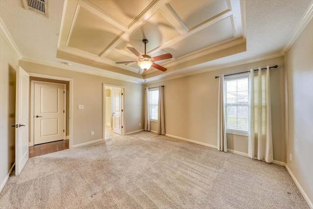 unfurnished bedroom featuring coffered ceiling, light colored carpet, ornamental molding, ceiling fan, and multiple windows