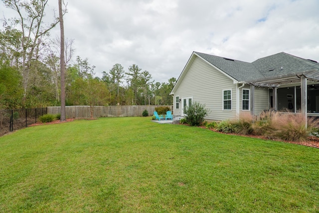 view of yard with a pergola and a patio area