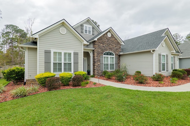 view of front of house with a front lawn