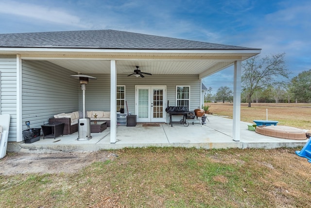 view of patio / terrace with an outdoor living space and ceiling fan