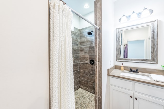 bathroom featuring vanity and walk in shower