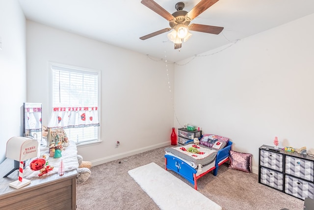 rec room featuring ceiling fan and light carpet