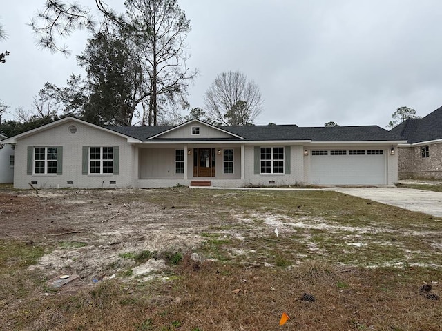 ranch-style house featuring a garage