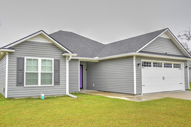 ranch-style house featuring an attached garage, roof with shingles, and a front lawn