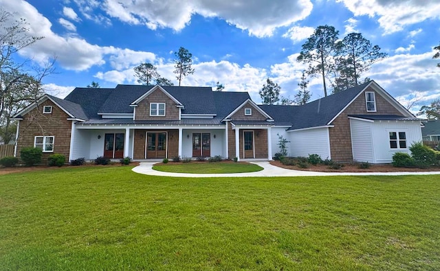 craftsman-style house featuring a front yard